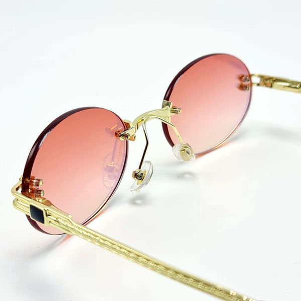 Сонцезахисні окуляри M&J Жіночі голограма рожево-золотистий (6015) 6015 фото
