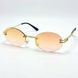 Сонцезахисні окуляри M&J Жіночі голограма рожево-золотистий (6015) 6015 фото 2