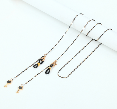 Ланцюжок для окулярів металевий M&J золотистий з чорним підвісом Ключ (180) 180 фото